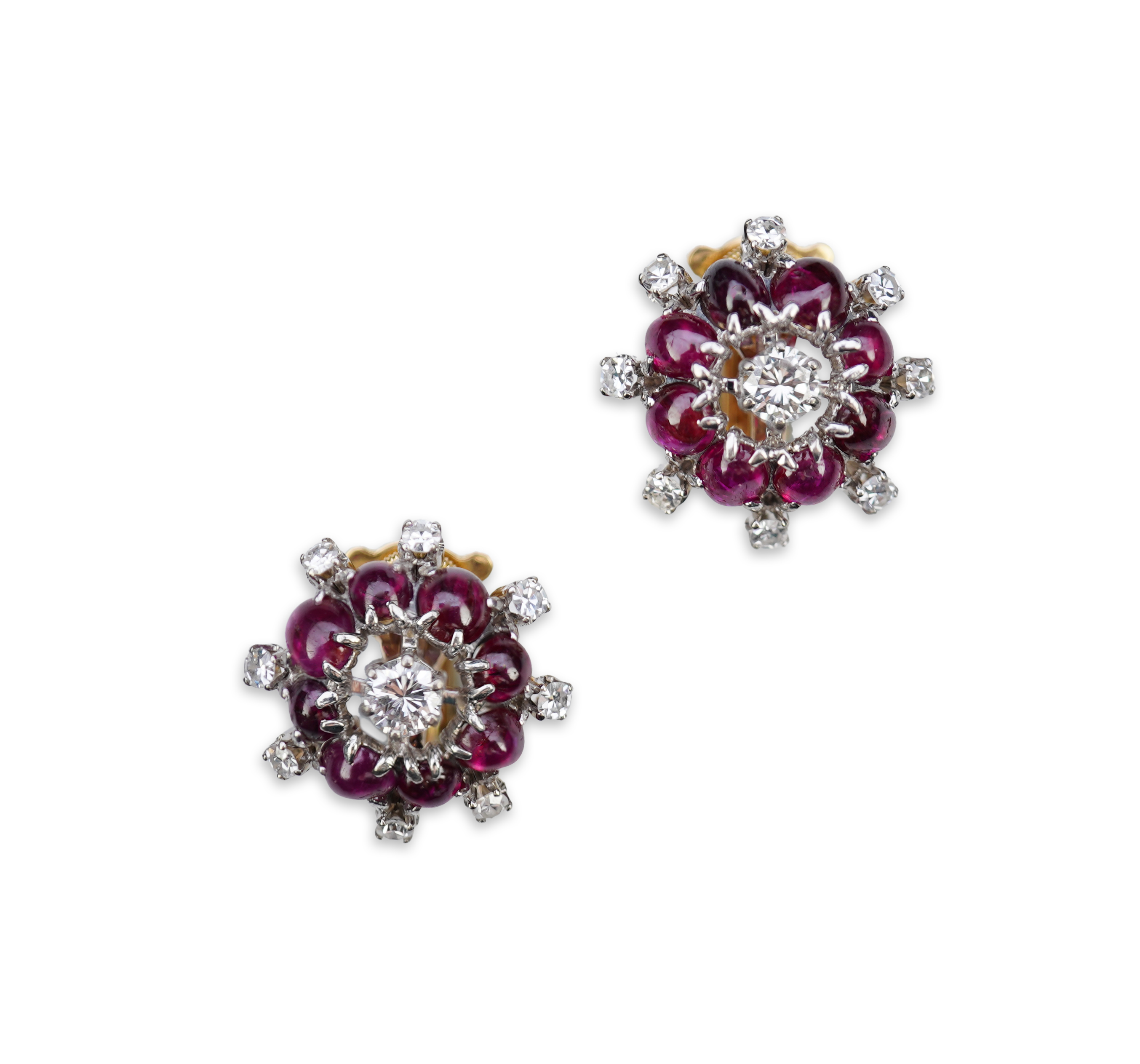 A pair of ruby and diamond ear clips, mid 20th century